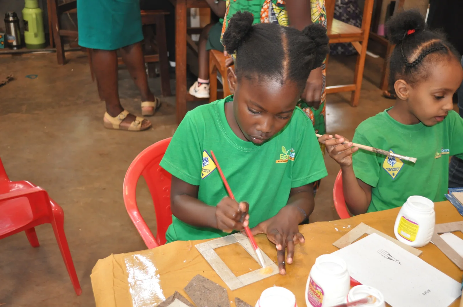Eco-Bloom pupils working on paper crafts during a workshop