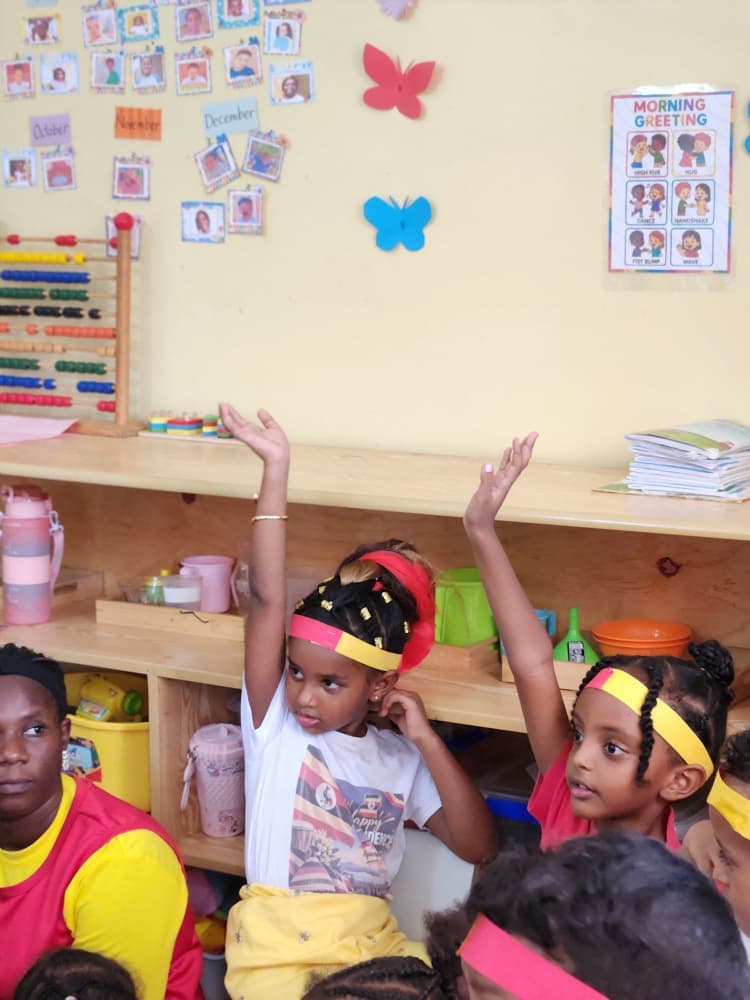 Eco-Bloom pupils joining in an Independence Day classroom activity