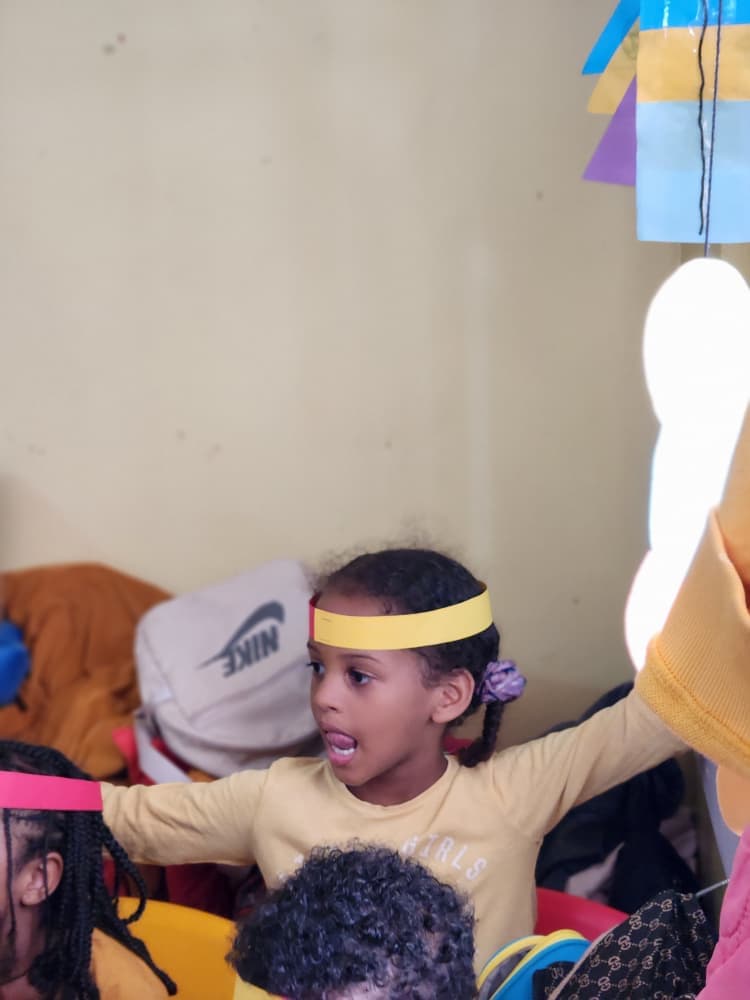 A young pupil taking part in the celebration