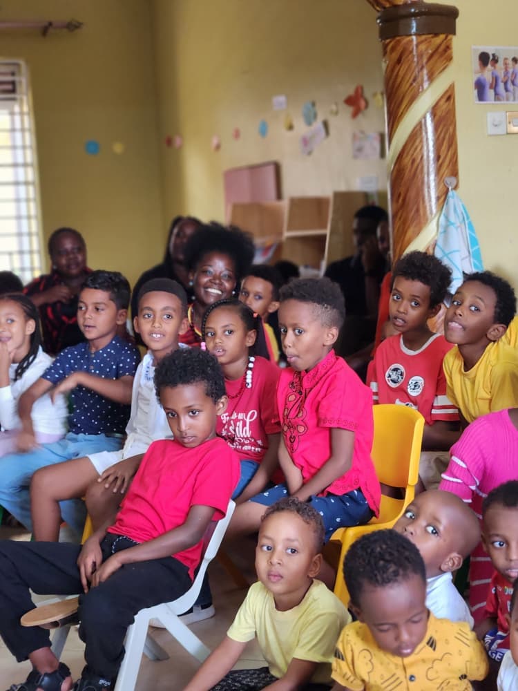 Children and families gathered for the school celebration