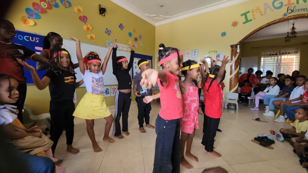 Eco-Bloom children performing together during the Uganda Independence Day celebration