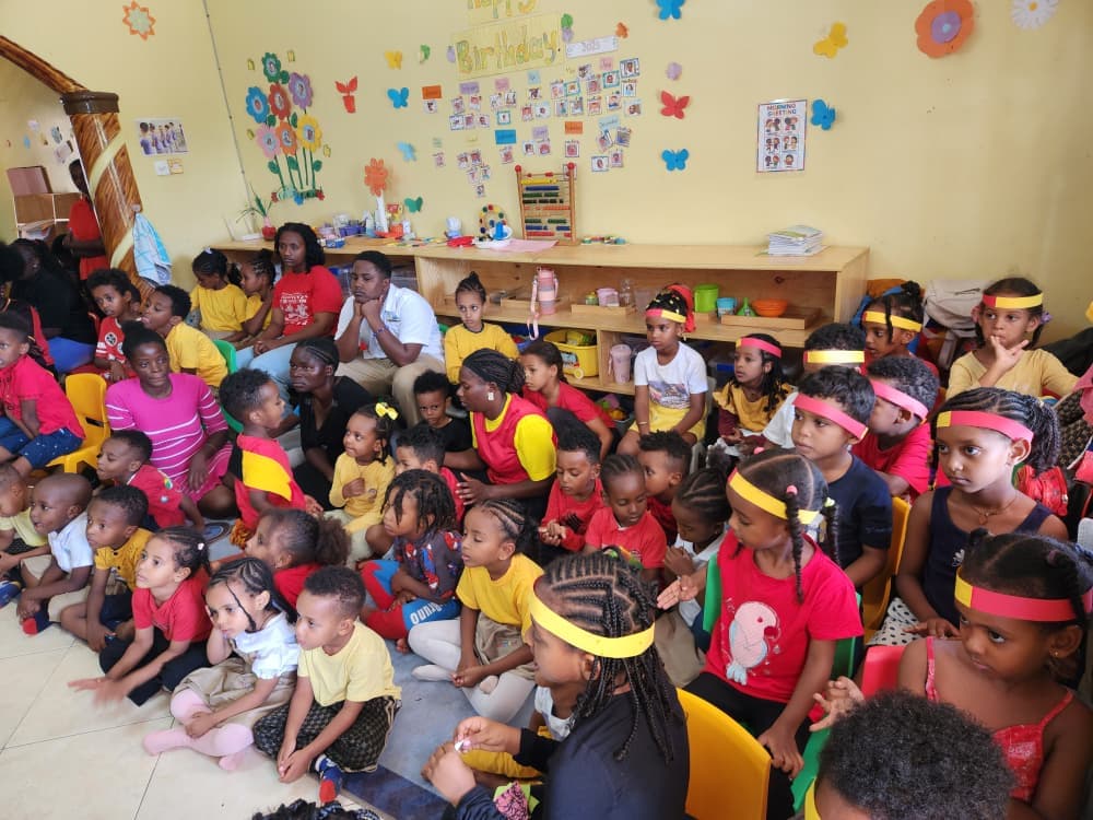 Children, families and staff gathered for the Uganda Independence Day celebration